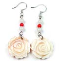 fashion earrings with white bead holding a beautiful flower decor pattern