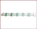 sterling silver bracelet with green cz stone forming special pattern 