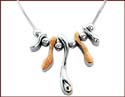 sterling silver necklace with two tone color motif wave line pattern
