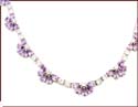 sterling silver necklace with purple cz stone forming flower pattern