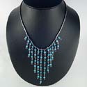 discount sterling silver necklace with string of blue cz stone in the center 